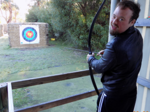 mac program disability person playing archery 