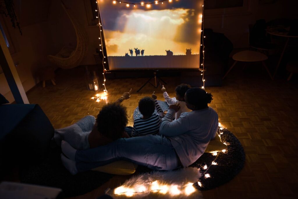 creating family memories together and family traditions - watching a movie together
